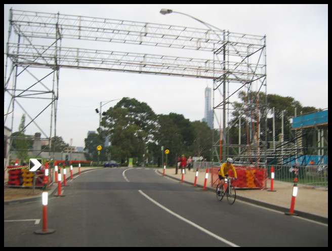 About to pass under the finish line on the road circuit
